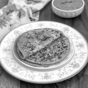 Moong Paratha (2 Pcs) With Dahi, Sindhi Papad And Achar
