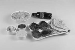 Veg Kabab 4 Pcs + Lachha Paratha + Veg Biryani Half + Coke 250 Ml