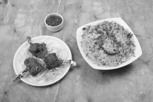 Chicken Biryani With Chicken Lollipop [half]