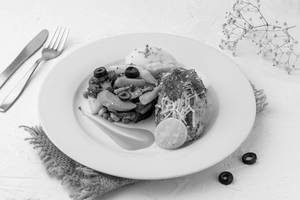 Parmesan Crusted Fish Steak With Creamy Garlic Sauce