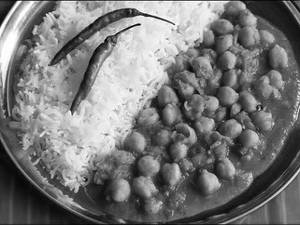Chole + Chawal / 3 Rotis + Achaar + Papad + Salad