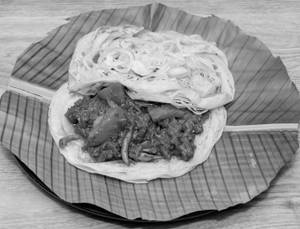 Kizhi Parotta ( Erachi )