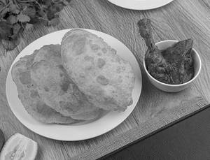 Luchi (3pcs) With Chicken Bhuna(2 Pcs)