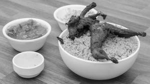 Kaadai Biryani(serves with raita)