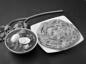 Parotta (2) With Chilly Egg (Semi Gravy 250 Ml)