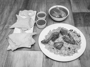 Hyderabadi Chiken Biryani Half (500 Gms) + 4 Pcs Chiken Curry Half 4 Pcs Rumali Roti 4 Pcs    