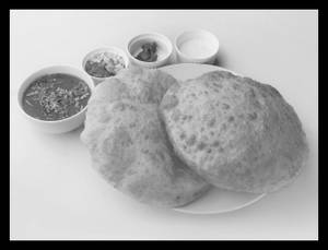 Chola Bhatura (2 Pcs) + Salad + Raita