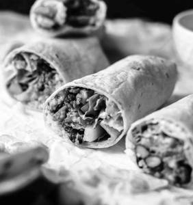Tex Mex Burritos Al Olio [tomato Salsa,rice,veg/ch/lamb,jalapeno,corn,bellpepper,wrappd In Tortilla]