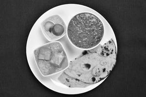 Shahi Paneer ( Half) + Dal Makhni ( Half) + 2 laccha Paratha