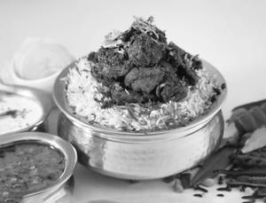 Chicken Fry Piece Biryani(serves withraita and salan )