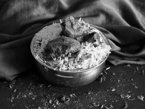 Chicken Biryani (Served with Raita)