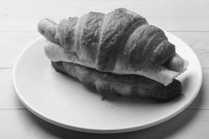 Butter Croissant With Omlette Chicken Sausage And Cheese