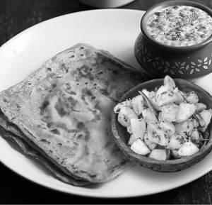 Plain Paratha-2, Aloo Jeera Sabji, Raita, Pickel.