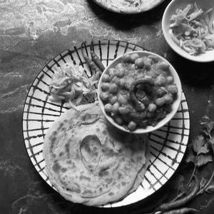 Punjabi Cholle (250 Ml) + 2 Lachha Parantha + Salad