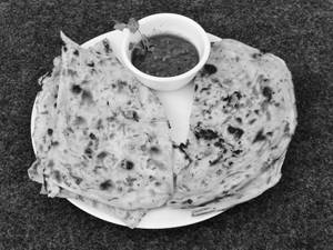 Butter Naan ( 1 Pc ) 
