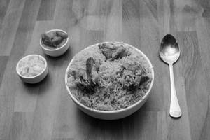 Mutton Biryani Regular(serves with raita)