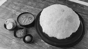 Punjabi Cholle +2bhature +1piecegulab Jamun