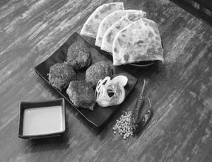 Mutton Galouti Kabab Ulta Tawa Combo ( 1 Plate Galouti Kabab (4 Pcs) + 2 Ulta Tawa Shahi Paratha)