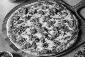 BUTTER CHICKEN TIKKA PIZZA