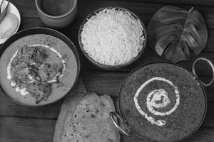 Boneless Butter Chicken With Dal Makhani Meal [Serves 2-3]