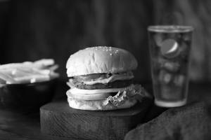 Crumbed Mutton Burger with Fries and Pepsi