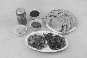 Aloo Matar , Bhindi Kurkuri  ( 4 Roti , Cold Drink Can , Salad, Sweet ) 