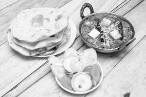 Kadhai paneer+4 Butter roti+Rice+Pickle+Salad