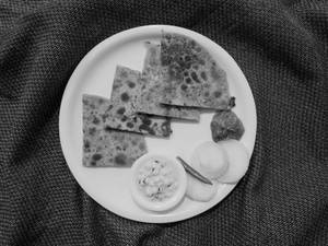 2 Paneer Paratha [served With Curd & Piclke]