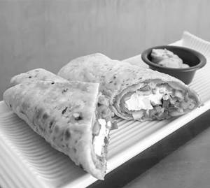 Paneer Roll Served With Tomato Ketchup