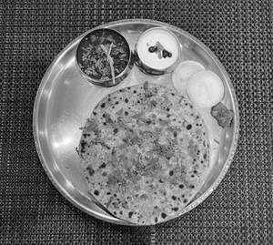 Paneer Paratha with Chole Curds & Accompaniments