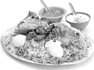 Chicken Biryani (Family) (1200 Gms) (Served with Raita & Salad)