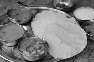 South Indian Thali[Rice + Veg Curry (1) + Dal + Sambar + chutney + Rasam + Curd + Papad + Pickle.]