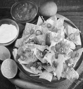 Nachos With Cheese Sauce And Salsa Sauce