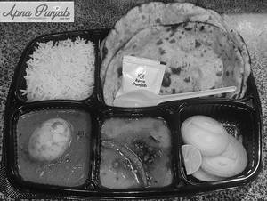 Anda Curry +dal Tadkai+rice+2 Butter Wheat Roti