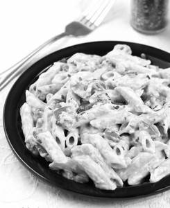 Classic Italian Pasta In Cheesy White Sauce With Veggies