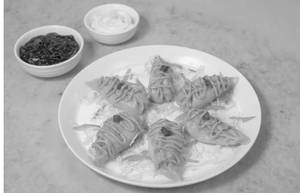 Steamed Paneer Peri Peri Momos