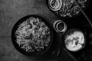 Veg Dum Biryani ( Served With Raita )