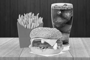 Crunchy Paneer Burger with Fries and Pepsi