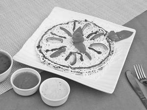 Schezwan Onion Uttapam