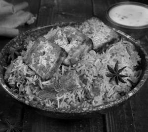 Paneer Tikka Biryani served with 250 ml raita