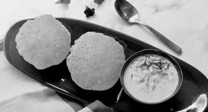 Poori With Basundi (4 Pcs)