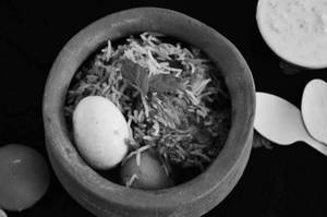 Egg Biriyani With Chicken Chap (1pc) , Salad & Cold Drinks (200ml)