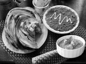 Dal Makhani With Laccha Paratha & Boondi Raita