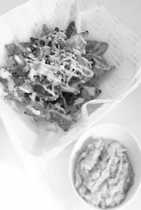 Loaded Nachos And Bacon Bits With Passion Guacamole