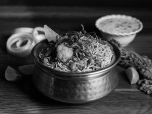 Veg. Hydrabadi Biryani + Papad + Raita