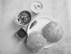 Chole Bhature + 1 Malai Lassi