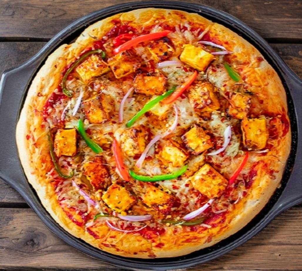 Order from Hanzo The woodfired Pizza online in Muzaffarpur | Swiggy